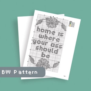 May include: Black and white cross stitch pattern for a home decor project. The pattern features the text "Home is where your heart should be".