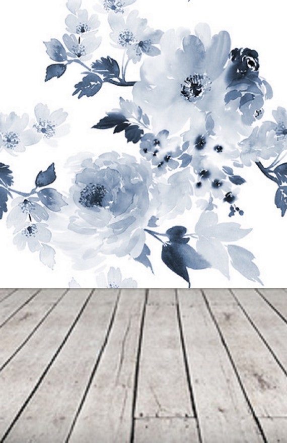 Premium Photo  A blue floral wallpaper with white flowers and leaves