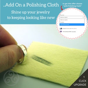 May include: A yellow polishing cloth with a silver ring being rubbed on it. The text "Add On a Polishing Cloth" is at the top of the image. The text "Shine up your jewellery to keeping looking like new" is below the polishing cloth. The text "to get this offer choose "with Polishing Cloth"" is on the right side of the image.