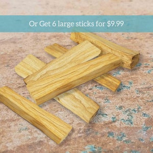 May include: Six large, light brown wooden sticks, stacked on a patterned surface. The text "Or Get 6 large sticks for $9.99" is displayed above the sticks.