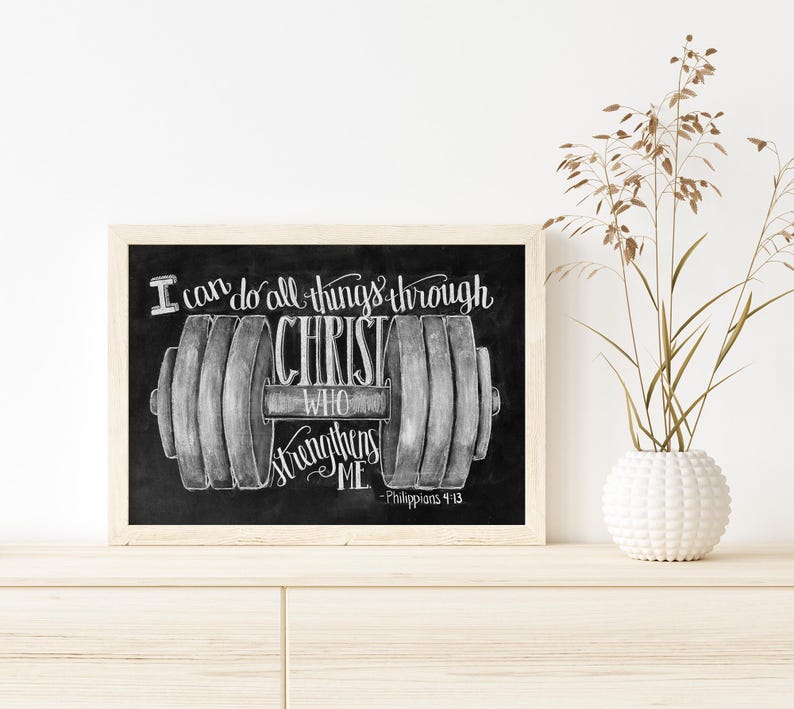 May include: Black framed art print with a chalkboard style design. The print features a dumbbell illustration with the text "I can do all things through Christ who strengthens me - Philippians 4:13."
