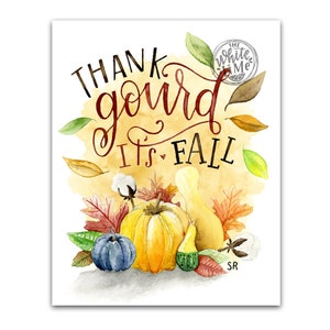 May include: Watercolor painting of gourds and fall leaves with the text "Thank gourd it's fall".