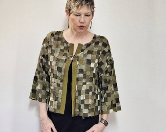 Upcycled recycled sustainable woman's coat.