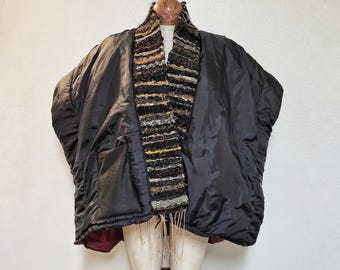 upcycled quilted unisex black oversized vest.
