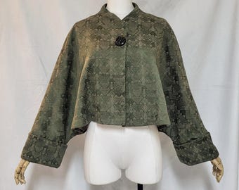 Upcycled woman's cropped green one of a kind coat.