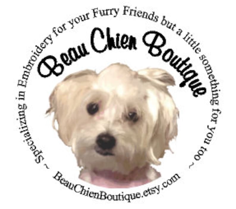 May include: A circular logo featuring a white, fluffy dog at the center. The text reads Beau Chien Boutique, Specializing in Embroidery for your Furry Friends but a little something for you too, and the web address BeauChienBoutique.etsy.com.