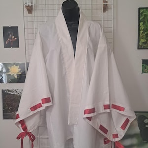 May include: A set of three ceramic mugs with a speckled, matte finish. The mugs are in shades of cream, light gray, and dark gray. Each mug has a simple, minimalist design, perfect for coffee or tea.