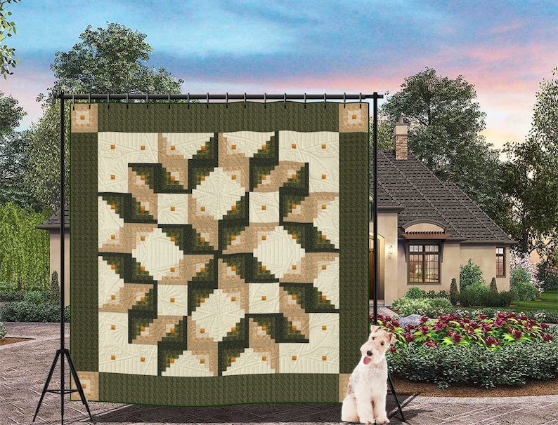 May include: A green, beige, and white quilt with a log cabin pattern. The quilt is hanging on a stand in front of a house.