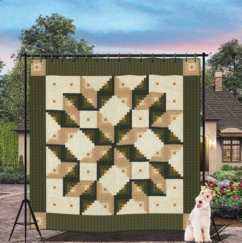 May include: A green and cream quilt with a log cabin pattern. The quilt is hanging on a black stand in front of a house and a green bush.