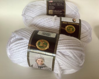 White HOMETOWN USA Lion Brand yarn in New York White color. 100 percent acrylic, soft yarn in bright white color 100