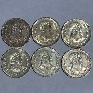 One Almost Uncirculated Mexican Silver Peso
