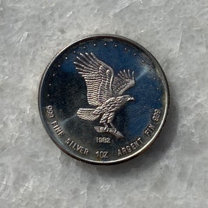 Monex 1 Troy Ounce Vintage .999 Silver Bullion Round