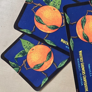 May include: Three vintage blue and white labels with illustrations of oranges and the text "FULL" and "WAVERLY GROWERS COOPERATIVE WAVERLY, FLORIDA Produce of U.S.A."