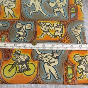 May include: A colorful wrapping paper with a repeating pattern of athletes in various sports. The paper features a wrestler, a boxer, a weightlifter, a cyclist, and a baseball player. The paper is decorated with orange, yellow, blue, and brown colors.