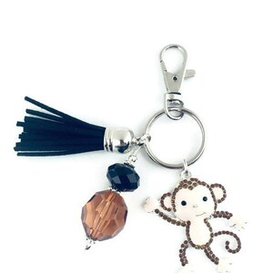 bag brand with monkey keychain