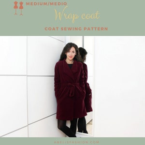May include: A woman wearing a burgundy wrap coat with a self-tie belt. The coat has a collar and pockets. The text "Wrap coat" and "COAT SEWING PATTERN" is visible above the woman. The text "MEDIUM/MEDIO" is visible above the text "Wrap coat".