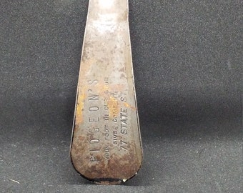 Vintage advertising metal stamped steel shoe horn