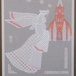 May include: White embroidered design of a woman in a long dress and veil walking towards a red church building with white trim. The background is a light gray fabric.