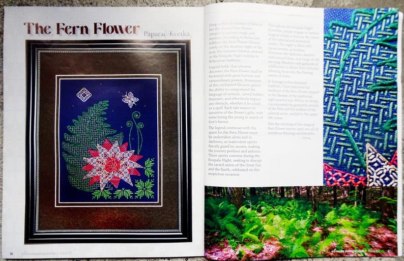 May include: A magazine page with the title "The Fern Flower" and a close-up image of a fern flower embroidery design. The embroidery is done in shades of green, pink, and white on a dark blue background. The text "Paparac-kvetka" is also visible on the page.