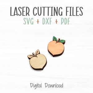 May include: Two peach shapes with green leaves, one peach is a lighter color than the other. The text "LASER CUTTING FILES SVG + DXF + PDF" is above the peaches. The text "Digital Download" is below the peaches.