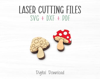 Puede incluir: Dos formas de hongo cortadas con láser, una con puntos blancos sobre fondo rojo y otra con círculos blancos sobre fondo de madera natural. Archivos de descarga digital SVG, DXF y PDF.