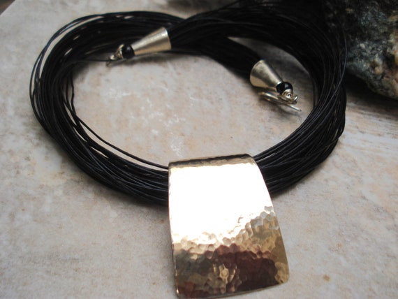 Multi Strand Black Cord Necklace with Hammered Silver Pendant Statement Metalwork Simplistic Silver Pendant Contemporary Unique Necklace