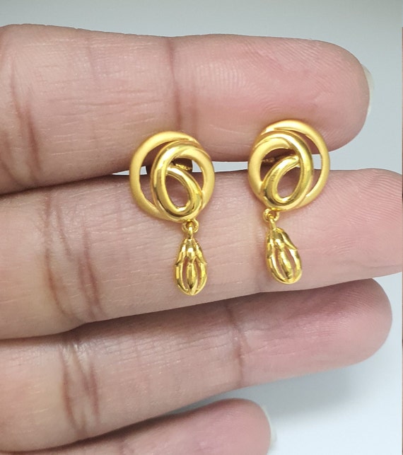 Silver, 22ct gold earrings – Vilders Gallery