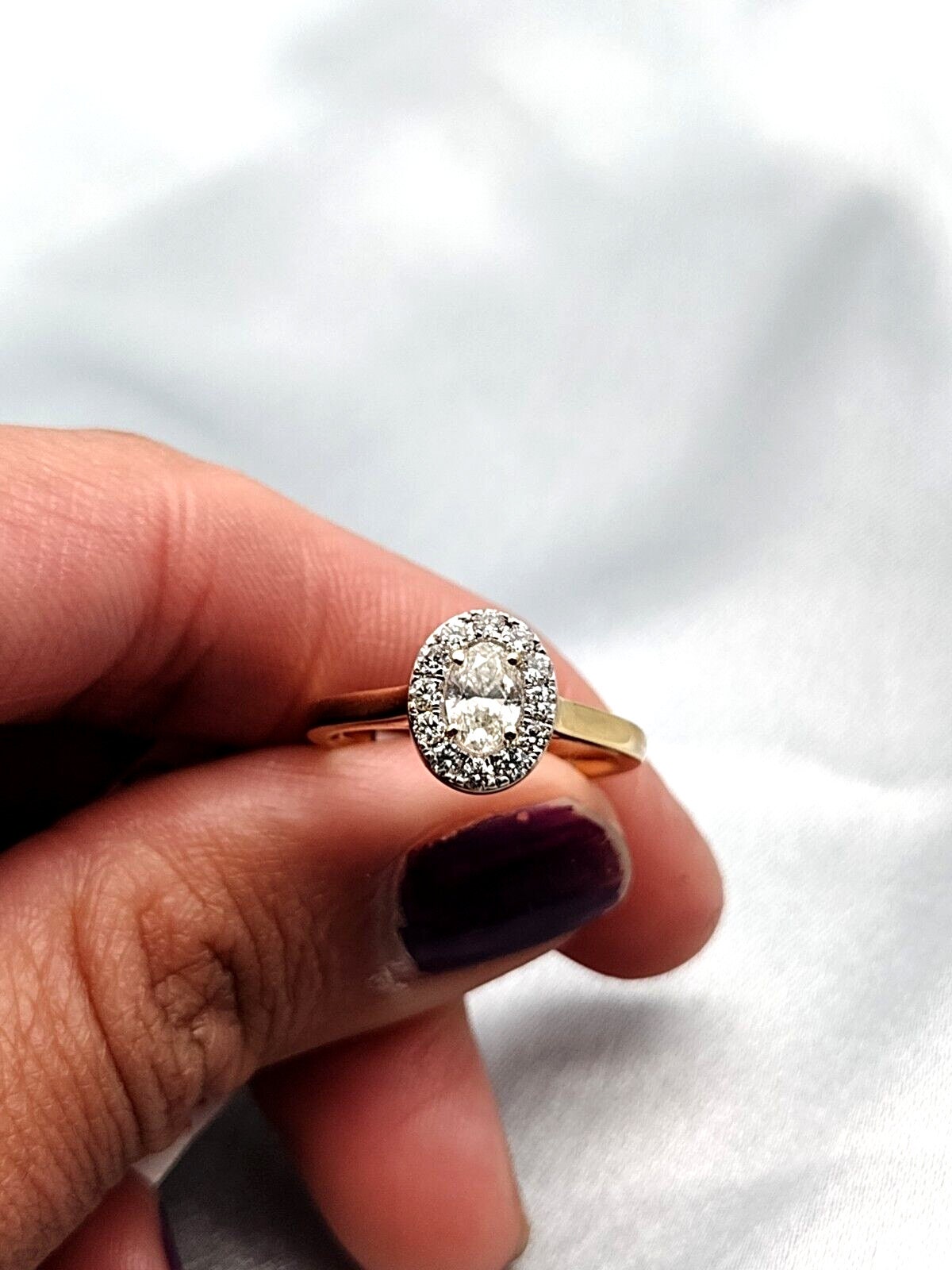 Yellow gold oval sale halo engagement rings