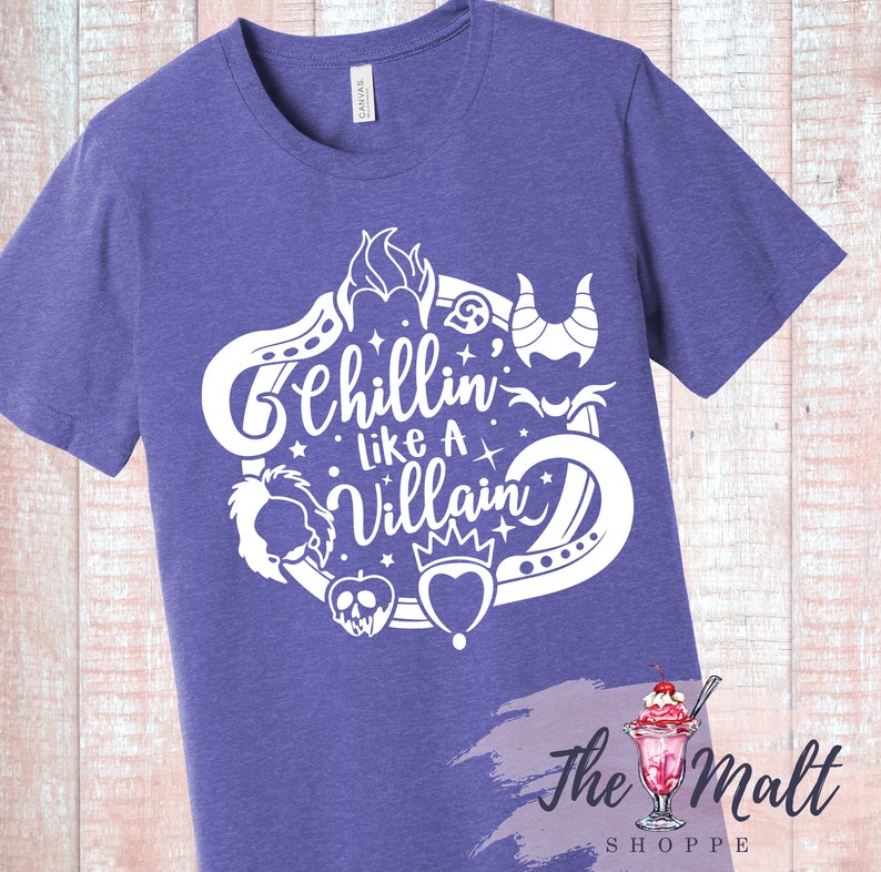 May include: Purple t-shirt with a white design that says "Chillin' Like A Villain" and features various Disney villain icons.
