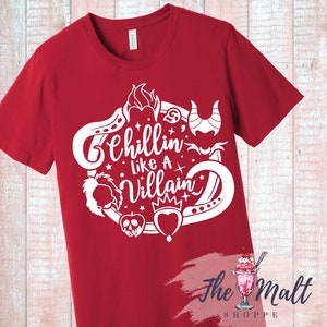 May include: Red t-shirt with a white design featuring the text "Chillin' Like A Villain" surrounded by various Disney villain icons.