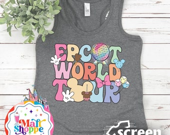 May include: Gray tank top with a colorful graphic that says "EPCOT WORLD TOUR" with Mickey Mouse ears and other Disney park icons.