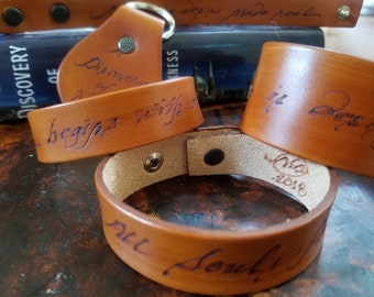 All Souls-Themed Leather Cuffs