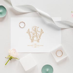 May include: A white card with a gold monogram of the letters "W" and "S" intertwined. The card is surrounded by white ribbon, flowers, and rings. The text "Instant Download" is printed below the monogram.