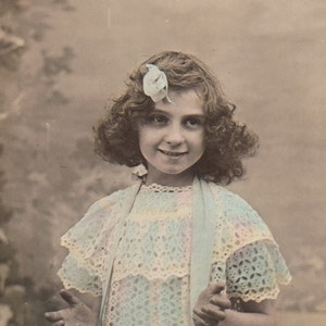 Vintage Romantic Children french postcard . Young girl with flowers.