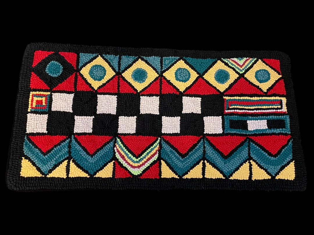 Tappeto con motivo geometrico fatto a mano con uncinetto e