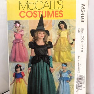 May include: McCall's Costumes pattern featuring various children's dress-up outfits. The costumes include a witch, princess, and other fairytale characters. The package is yellow with the text "McCall's Costumes" and the pattern number M5494.