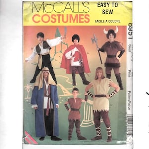 May include: McCall's Costumes sewing pattern featuring various costume designs. The cover displays images of children in different outfits, including a Viking, a medieval knight, and a royal figure. The text "Easy to Sew" is visible.