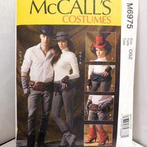 May include: A McCall's Costumes sewing pattern, M6975, featuring steampunk-inspired outfits. The cover shows a couple in costume, with additional detail images of accessories like hats, gloves, and boots. The color scheme is primarily yellow, brown, and black.