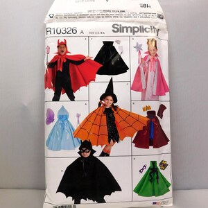 May include: Simplicity sewing pattern R10326 for children's costumes. The package features illustrations of various costumes, including a devil, witch, fairy, and superhero. The costumes are designed in sizes S-L.