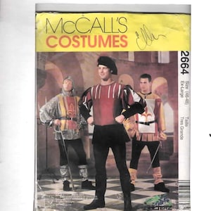 May include: McCall's Costumes pattern 2664 in size Ex-Large. The envelope features three individuals wearing medieval-style tunics, black leggings, and hats. The central figure wears a red and black tunic with puffed sleeves, while the others wear yellow and white tunics with fleur-de-lis emblems and chainmail-style hoods.