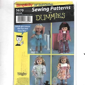 May include: A Simplicity 5670 sewing pattern envelope for 18-inch doll clothes titled Sewing Patterns For Dummies. The yellow and black packaging features illustrations of four dolls wearing various outfits, including a blue tutu and floral pants.