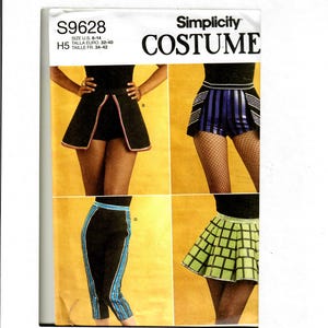 May include: Simplicity Costume sewing pattern number S9628 for sizes US 6-14, Euro 32-40, and French 34-42. The pattern includes four different costume designs: a black skirt with a red and white trim, a blue and white striped skirt with a black trim, a black skirt with a blue trim, and a green and black checkered skirt with a black trim.