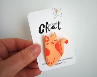 Broche de gato de jengibre