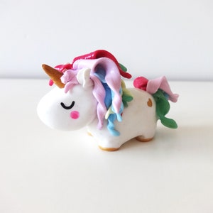 Figura de unicornio. Hermione la unicornio. Amuleto.