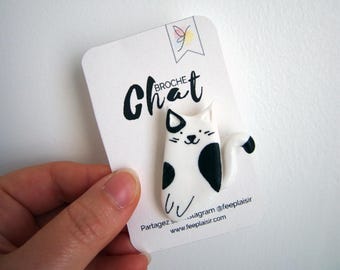 Broche de gato blanco y negro