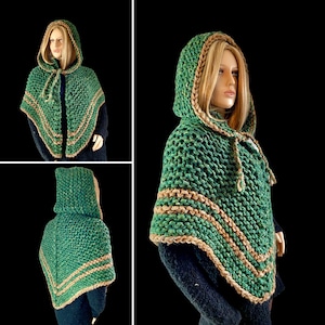 May include: A green hooded knitted poncho with a brown trim. The poncho is made with a chunky yarn and has a loose fit.
