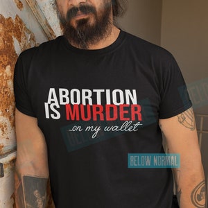 Camiseta unissex aborto é assassinato na minha carteira