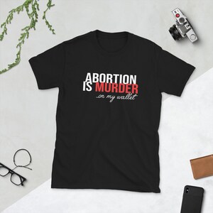 Abortion is Murder ...On My Wallet Kurzärmeliges Unisex-T-Shirt