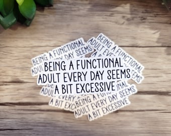 May include: A stack of white stickers with black text that reads "Being a functional adult every day seems a bit excessive".