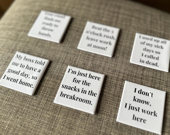 May include: Set of ten white ceramic coasters with funny sayings printed in black. The sayings include: "My boss told me to have a good day, so I went home.", "I'm just here for the snacks in the breakroom.", "Beat the 5 o'clock rush. Leave work at noon!" , "I used up all of my sick days so I called in dead.", "I don't know, I just work here."